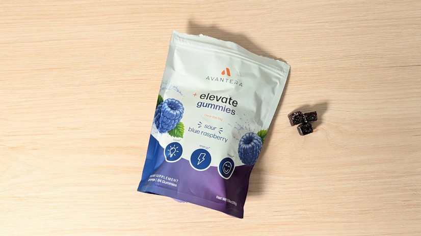 Avantera Elevate gummies on a wood surface.