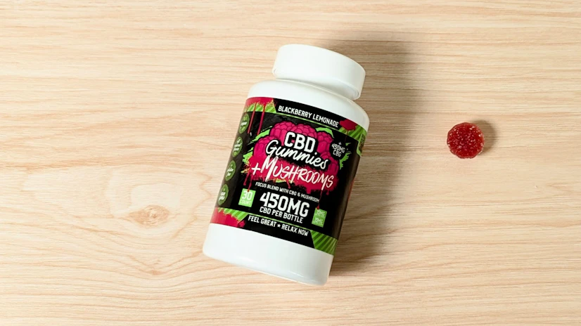 Hemp Bombs CBD + Mushrooms on a wooden surface