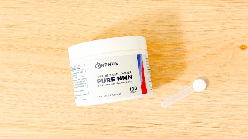 Renue by Science NMN powder on a wood countertop