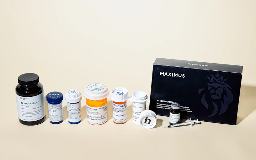 medication bottles, vials, syringes, and more form the top online trt clinics against a cream background