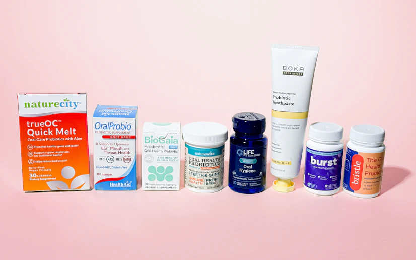 The best oral probiotic products lined up against a beige background.