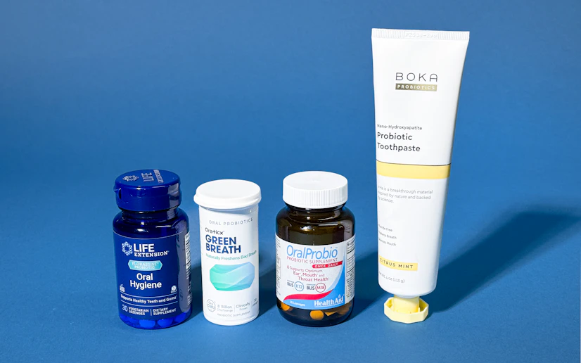 The best probiotic products for bad breath lined up against a blue background.