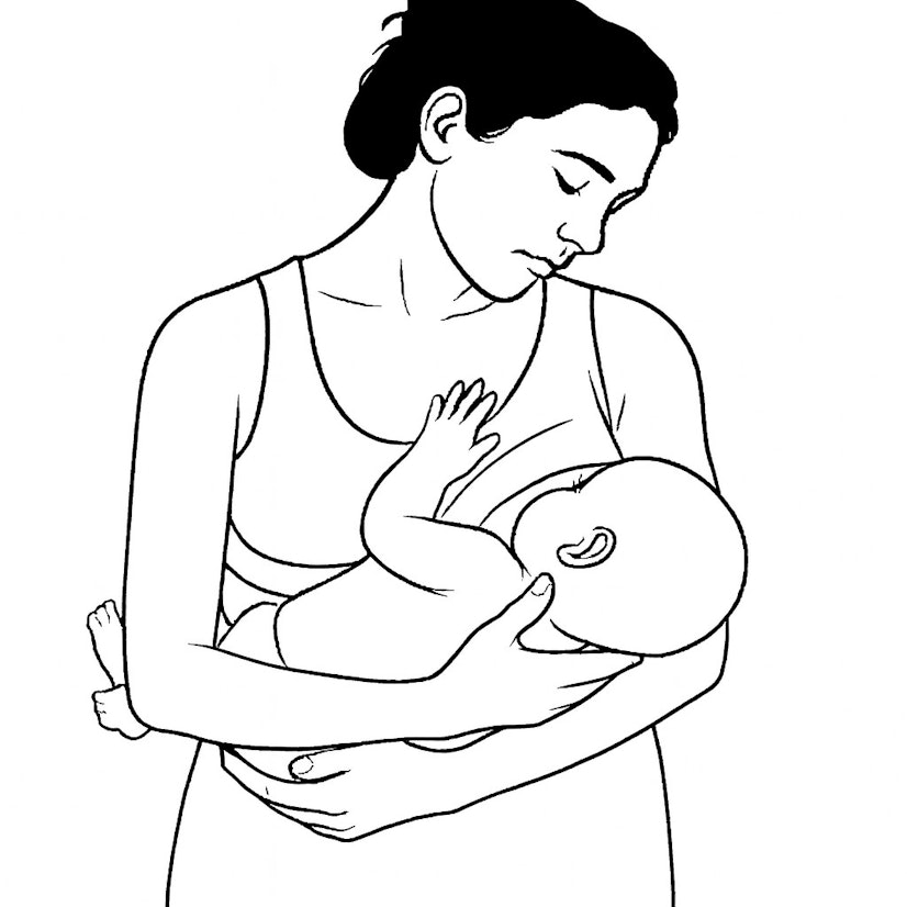 Parent breastfeeding an infant using the cross-cradle hold, with the baby’s head supported by the opposite hand and body facing the parent.