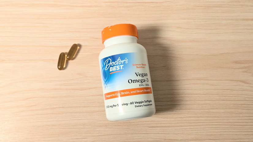 Doctor’s Best Vegan Omega-3 on a wood surface.