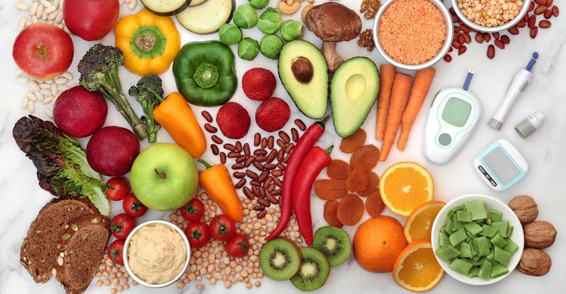 assorted staple foods and a blood sugar monitor