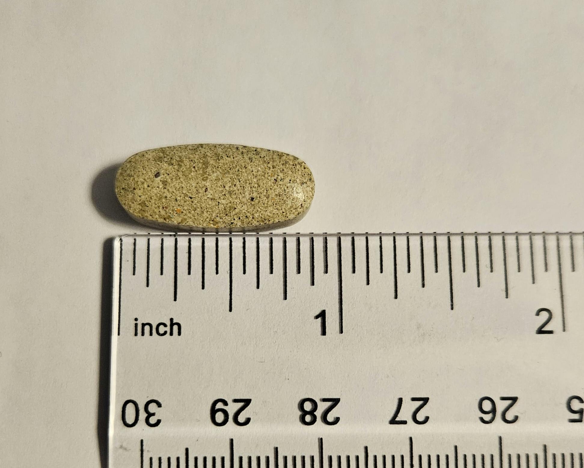 showing the size of a Rainbow Light menopause supplement capsule